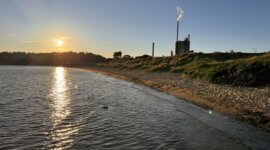ondergaande zon op Naaktstrand Knähaken
