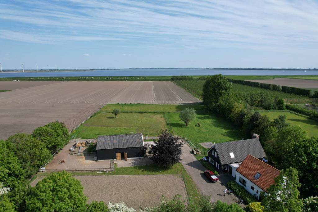 luchtopname van het terrein van Naturisten Accommodatie Sans Voiles