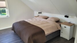 slaapkamer met tweepersoonsbed