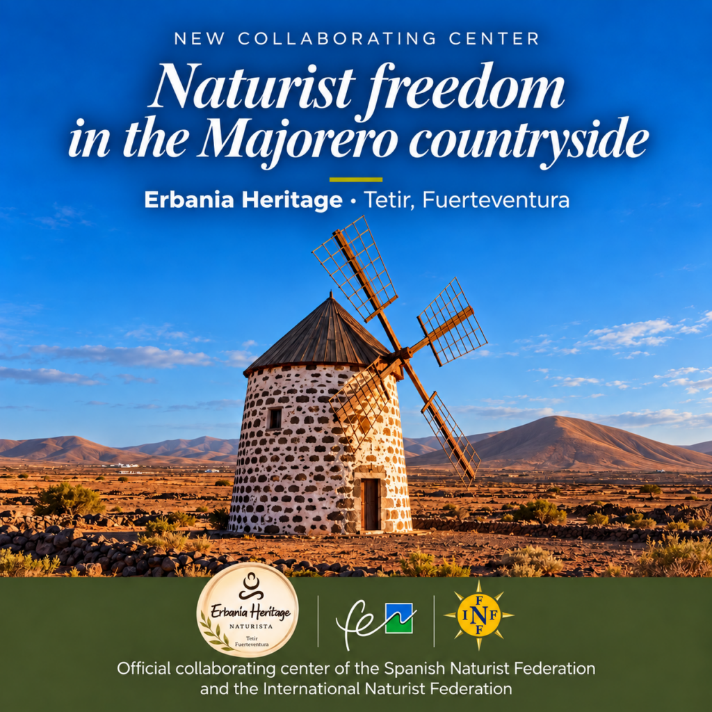 Molen in het landschap bij Naturisten Accommodatie Erbania Heritage